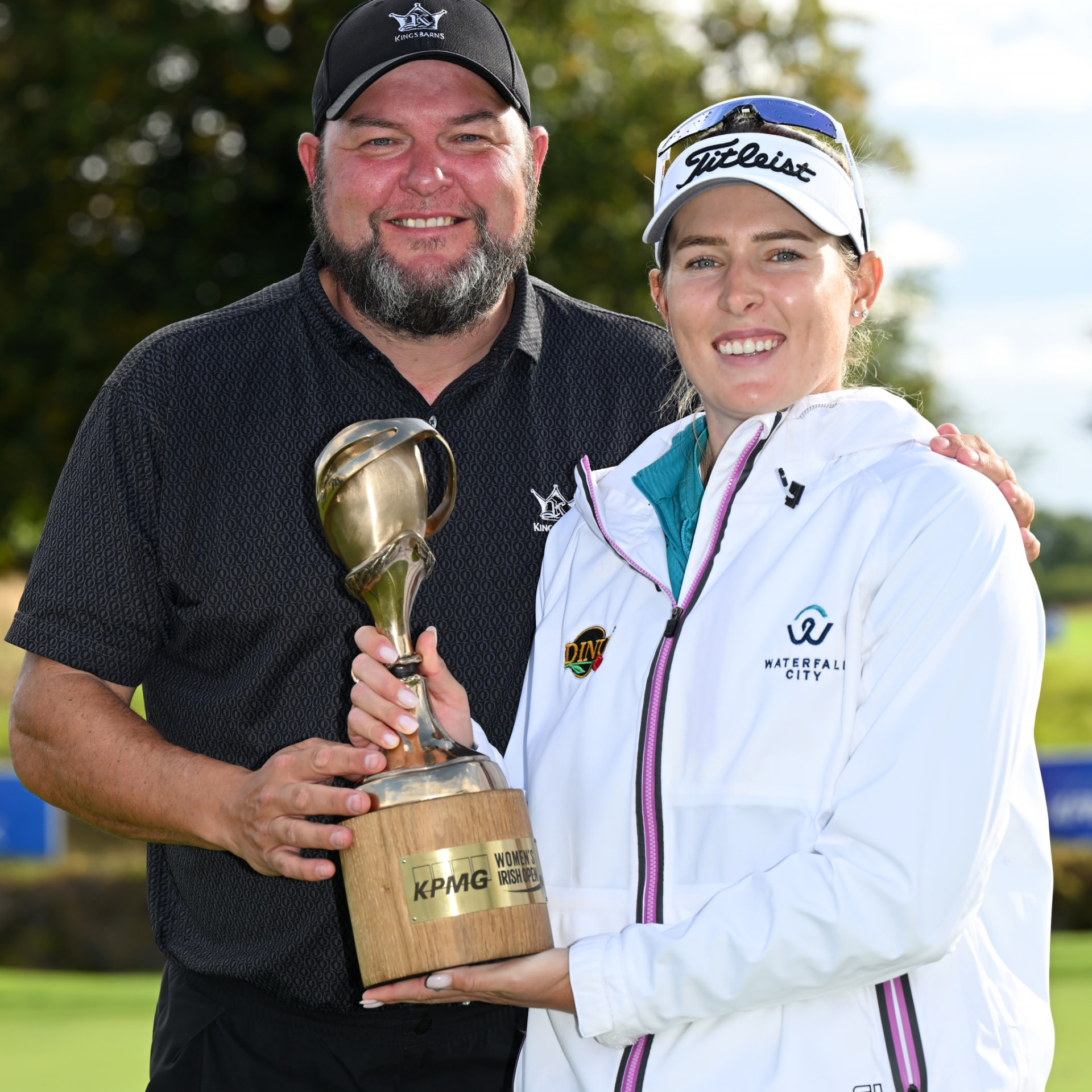 Caddie and player celebrating with the KPMG Women's Irish Open trophy