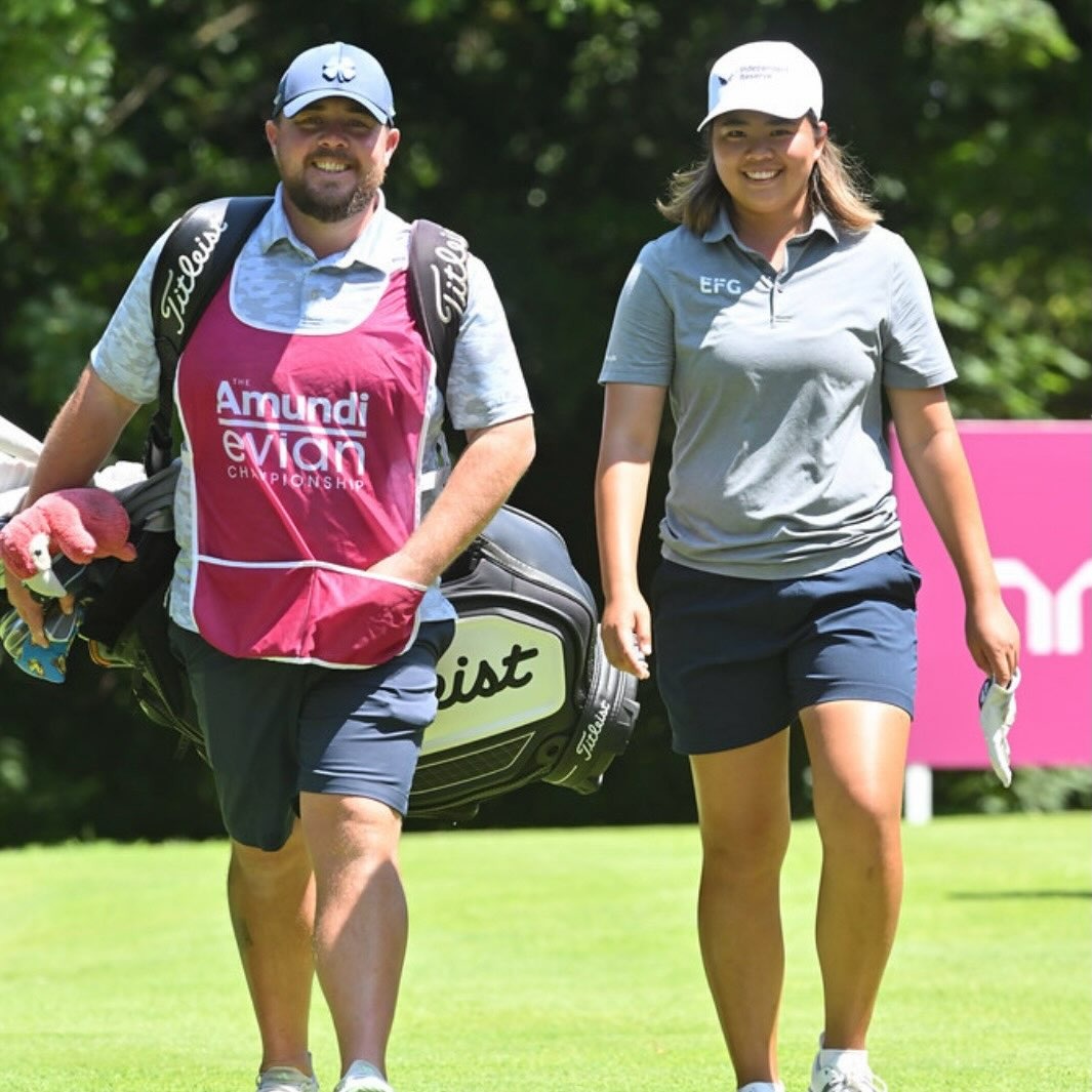 Caddie and player walking the fairway at the Amundi Evian Championship